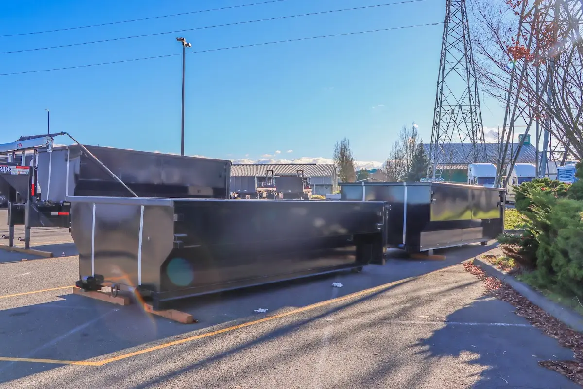 Roll-off dumpster ready for waste disposal at job site for Construction Dumpster Rental in Belmont